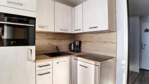 Résidence Coryles A - Appartement rénové avec coin montagne · Accès direct aux pistes · Balcon MAE-1064