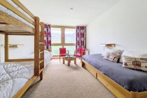 Résidence Nant Benoit - Appartement triplex confortable · Départ et retour skis aux pieds · Balcon MAE-2894