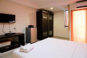 Cozy and Homey Studio Apartment at High Point Serviced By Travelio