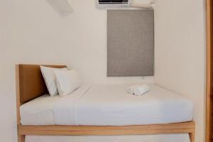 Warm and Comfort Stay 2BR at Sky House BSD Apartment By Travelio