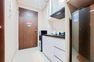 Cozy Living Studio at Transpark Bintaro Apartment By Travelio