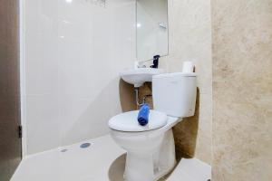 Cozy Living Studio at Transpark Bintaro Apartment By Travelio