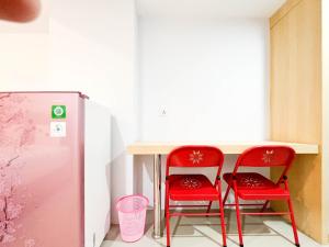 Homey and Cozy Studio at De Prima Apartment By Travelio