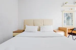 Homey and Elegant Studio Amazana Serpong Apartment By Travelio - Cileduk 1