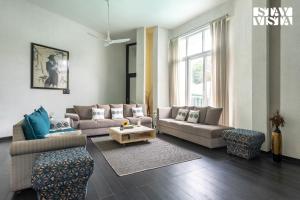 StayVista at Bayside Oasis with Outdoor Pool, WiFi