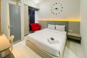 Comfortable 1BR without Living Room at Amartha View Apartment By Travelio
