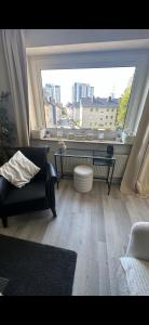 FEWO am Deich 1 Zentral mit Stadtblick und Kontaktloser Check in