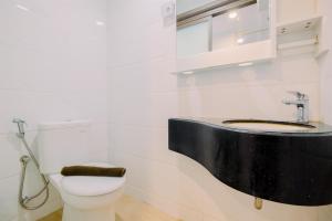 Strategic Studio Apartment Sky House BSD near AEON Mall By Travelio