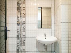 Minimalist Studio at De Prima Apartment By Travelio