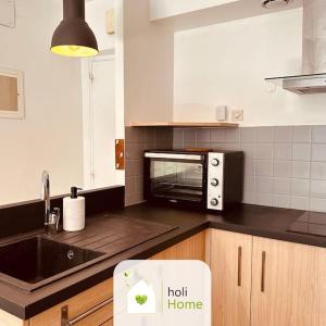 Appartements H11 Petit duplex citadin : photos des chambres