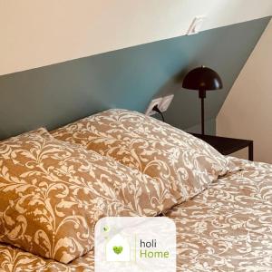 Appartements H11 Petit duplex citadin : photos des chambres
