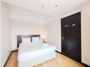 Tranquil Designed 2BR at Braga City Walk Apartment By Travelio
