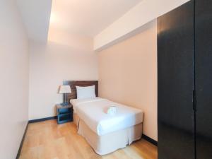 Tranquil Designed 2BR at Braga City Walk Apartment By Travelio
