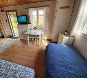 Mysig stuga med havsutsikt på Sydkoster