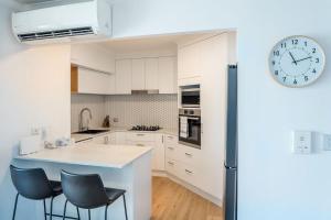 Stylish Central City Retreat with Pool Parking