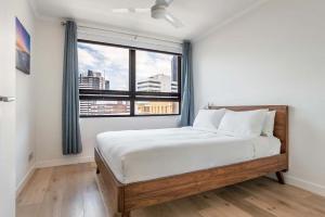 Stylish Central City Retreat with Pool Parking
