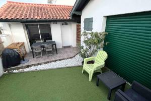 Maisons de vacances Charmante Maisonette a 3,5km de l-ocean, en coeur de ville : photos des chambres