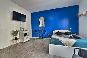 Appartements Paradis Bleu - Coeur de ville, Tv 4K, Netflix, Fibre, Confortable, Calme : photos des chambres