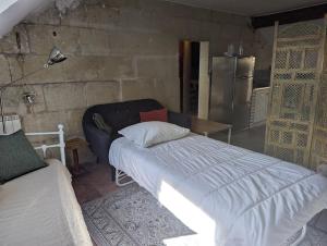 Appartements Appartement des hirondelles , au pied du chateau : photos des chambres