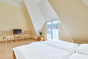 Haus 136, Wacholderweg 7