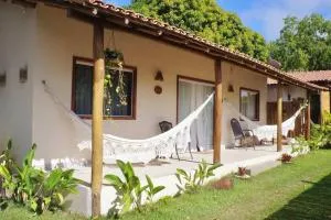 Casa a 4 minutos a pé da praia com 3 quartos climatizados - Itamaraju