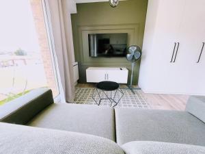 Appartements ModernCosy Pres Disneyland Paris : photos des chambres
