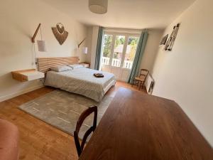 Sejours chez l'habitant L-Ecrin de Famille Maison Mer & Bourg Gold Beach : photos des chambres