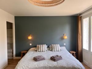 Sejours chez l'habitant L-Ecrin de Famille Maison Mer & Bourg Gold Beach : photos des chambres