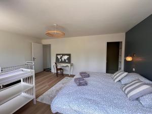 Sejours chez l'habitant L-Ecrin de Famille Maison Mer & Bourg Gold Beach : photos des chambres