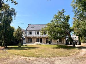 Sejours chez l'habitant L-Ecrin de Famille Maison Mer & Bourg Gold Beach : photos des chambres