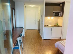 Appartements Studio Harmonie Confluence Lyon City et piscine chauffante : photos des chambres