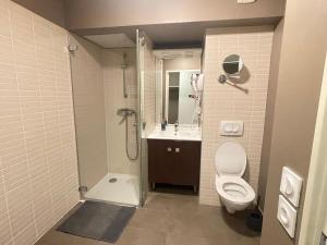 Appartements Studio Harmonie Confluence Lyon City et piscine chauffante : photos des chambres