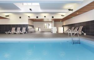 Appartements Studio Harmonie Confluence Lyon City et piscine chauffante : photos des chambres