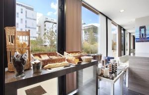 Appartements Studio Harmonie Confluence Lyon City et piscine chauffante : photos des chambres