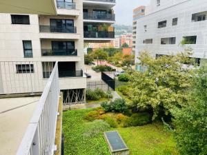 Appartements Studio Harmonie Confluence Lyon City et piscine chauffante : photos des chambres