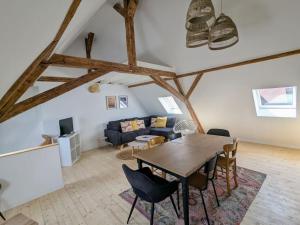 Appartements Le grenier du Rempart, appartement au coeur du village : photos des chambres