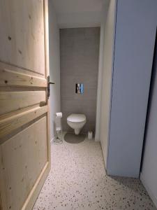 Appartements Le grenier du Rempart, appartement au coeur du village : photos des chambres
