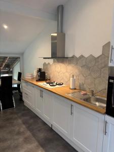 Appartements L-escapade des Vignes : photos des chambres