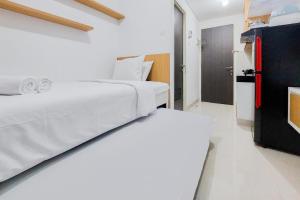 Lovely and Cozy Studio at Serpong Garden Apartment By Travelio