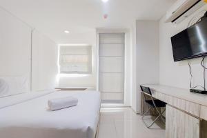Fancy and Nice Studio Apartment at Tuscany Residence By Travelio