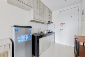 Fancy and Nice Studio Apartment at Tuscany Residence By Travelio