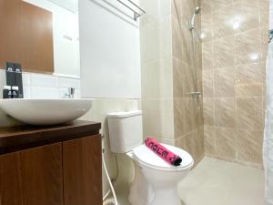 Great Choice and Modern 2BR at Transpark Juanda Bekasi Timur Apartment By Travelio