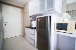 Modern and Homey Studio at Tanglin Supermall Mansion Apartment By Travelio