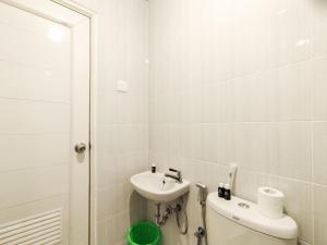 Classic Studio (No Kitchen) with City View at Lodge Paskal Apartment By Travelio