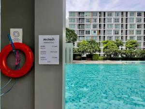 Cozy D Condo Sign Near Central Fest