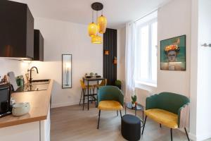 Appartements Le Jungle - Votre sejour tout confort - Fibre : photos des chambres