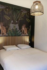 Appartements Le Jungle - Votre sejour tout confort - Fibre : photos des chambres