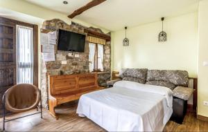 La Tienda de Abajo - Apartamentos acogedores con calefacción, parking y vistas al Valle de Soba