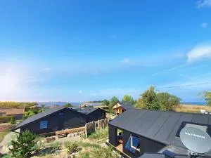 Werder Chalet -- COZYKOJE -- Ostsee Strand 150m I Sauna I eKamin I Tiny House mit Meerblick I 2 Pers und Kind I by "Meyers am Meer" - Stove