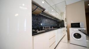 Exclusive 2BR Connected to Mall Apartment at Aryaduta Residence Surabaya By Travelio